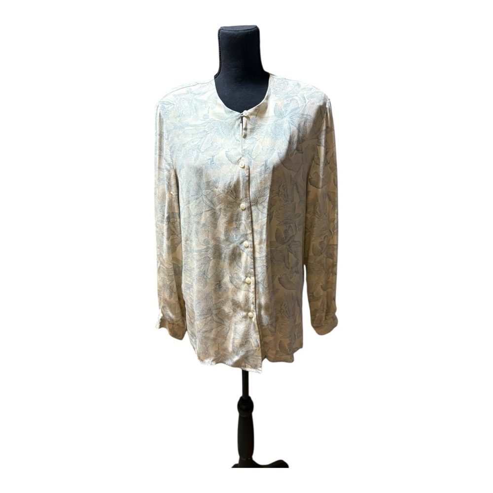 Liz Claiborne long sleeved silk button-down shirt with a light-colored floral .